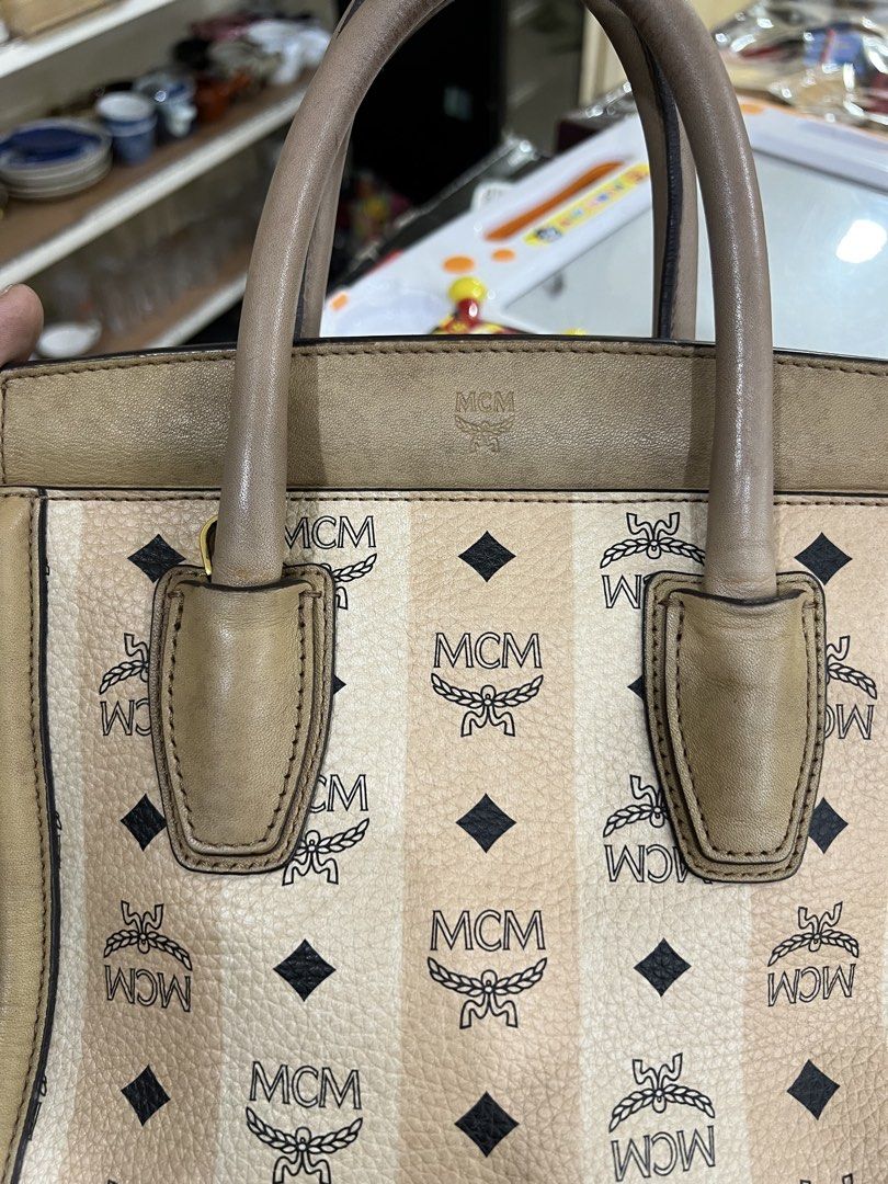 MCM Small Kathy Double Zip Tote (Category: Luxury Bags & Wallets) located in Bacolod City. Submitted by novymae23 (Listing ID 1449108232, Image 3). Description: MCM Small Kathy Double Zip Tote in Beige Size Medium Excellent Condition.