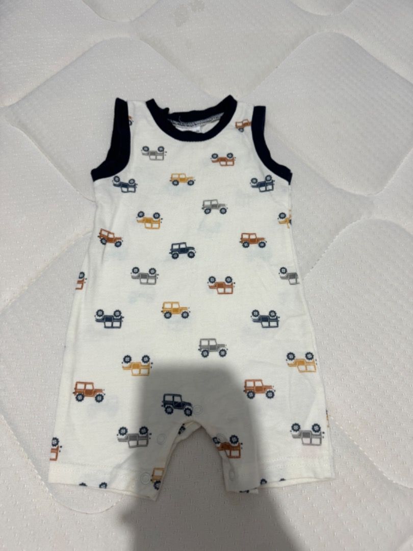 Mimi Threads Baby Romper 6 Months - Jeep Print (Category: Babies & Kids Fashion) located in Manila. Submitted by louvemaria (Listing ID 1449268779, Image 1). Description: - Adorable sleeveless romper for your little one. - Features a fun and vibrant jeep print. - Made with soft fabric for maximum comfort. - Ideal for keeping your baby cool in warm weather. - Size: 6 months..
