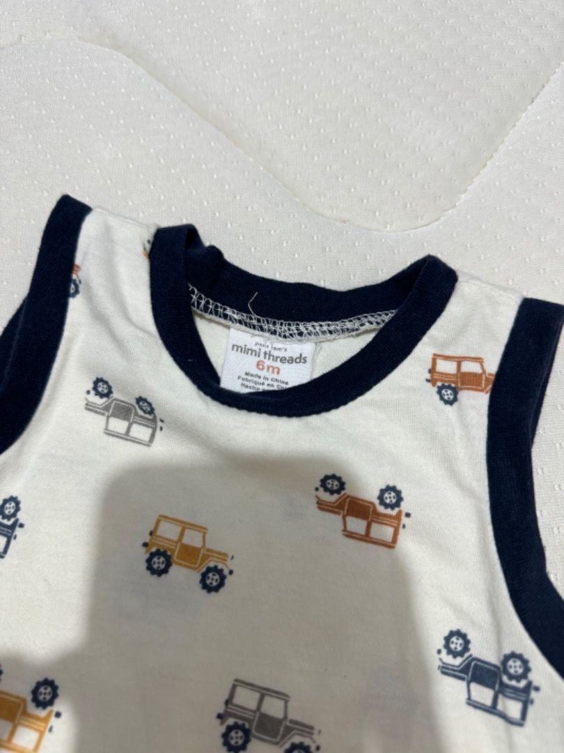 Mimi Threads Baby Romper 6 Months - Jeep Print (Category: Babies & Kids Fashion) located in Manila. Submitted by louvemaria (Listing ID 1449268779, Image 2). Description: - Adorable sleeveless romper for your little one. - Features a fun and vibrant jeep print. - Made with soft fabric for maximum comfort. - Ideal for keeping your baby cool in warm weather. - Size: 6 months..