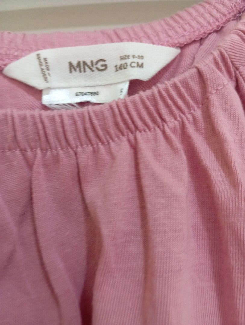 MNG Pink Flutter Sleeve Top Size 9-10 Years (Category: Babies & Kids Fashion) located in San Juan City. Submitted by kdlshoppeph (Listing ID 1449149297, Image 2). Description: - Original Mango Kids pink top with charming flutter sleeves. - Comfortable elasticated neckline for easy wear. - Perfect for casual outings and everyday style. - Sized for 9-10 years or 140cm height. - used only once.