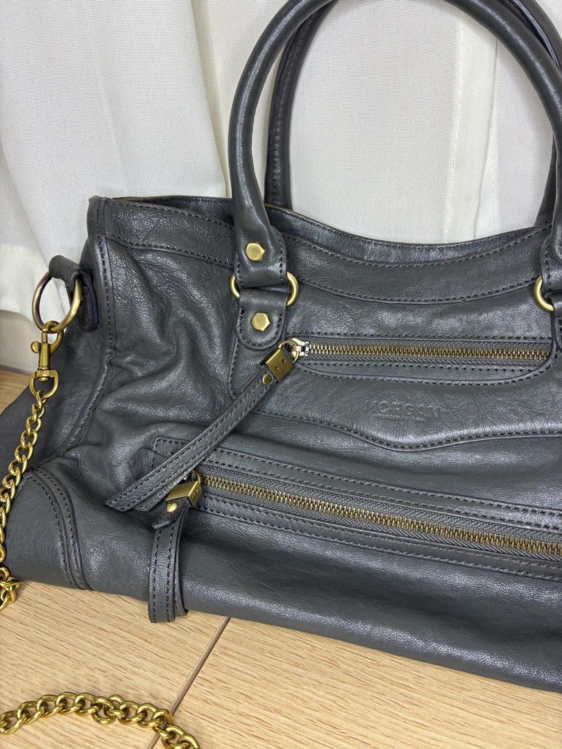 MORGAN Grey Leather Handbag with Gold Chain (Category: Luxury Bags & Wallets) located in Manila. Submitted by tomtomsworld (Listing ID 1449191099, Image 2). Description: - MORGAN grey leather handbag - Detachable gold chain strap - Multiple zippered pockets on the front - Interior lining with MORGAN logo pattern - Stylish and perfect for everyday use.