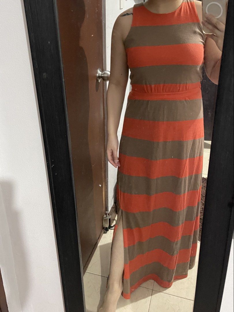 Mossimo Striped Maxi Dress with Slit Fits Medium (Category: Dresses) located in Mandaluyong City. Submitted by blzstr (Listing ID 1449279082, Image 2). Description: - Chic orange and taupe striped maxi dress - Sleeveless halter design - Flattering cinched garterized waist - Convenient slit for ease of movement - Stylish back keyhole detail with button closure - Made from soft, flowy fabric - Ideal for casual outings or a beach day - very comfy to