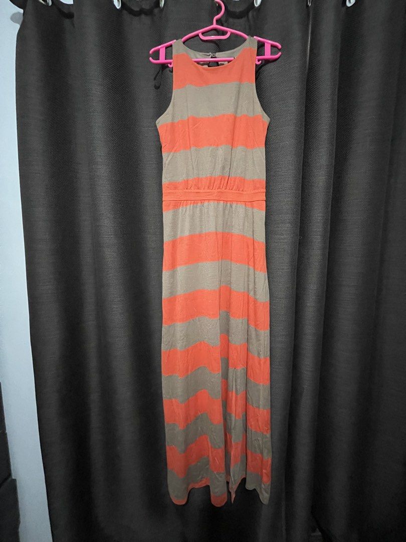 Mossimo Striped Maxi Dress with Slit Fits Medium (Category: Dresses) located in Mandaluyong City. Submitted by blzstr (Listing ID 1449279082, Image 1). Description: - Chic orange and taupe striped maxi dress - Sleeveless halter design - Flattering cinched garterized waist - Convenient slit for ease of movement - Stylish back keyhole detail with button closure - Made from soft, flowy fabric - Ideal for casual outings or a beach day - very comfy to