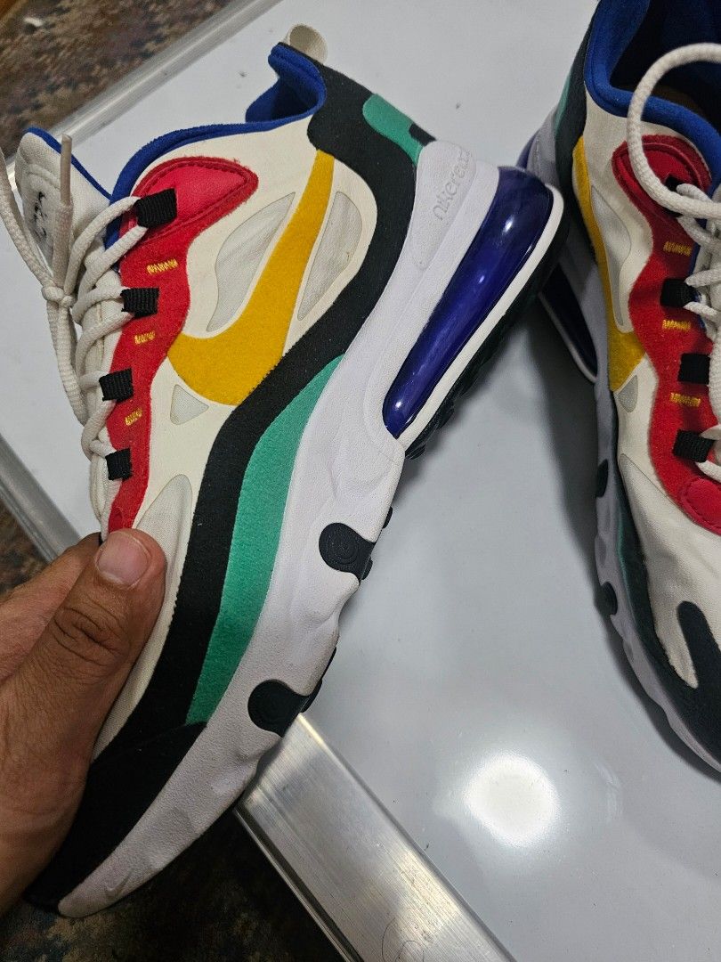 Nike Air Max 270 React "Bauhaus" Multi-Color (Category: Sneakers) located in Quezon City. Submitted by ryanstuff.ph (Listing ID 1449143802, Image 2). Description: - Nike Air Max 270 React "Bauhaus" colorway - Vibrant mix of white, red, yellow, green, and blue - Features the iconic visible Air Max bubble - Ideal for everyday wear and running - Bold and eye-catching design 9/10 slightly used no box galing kase balikbayan box rfs: medyo maliit sa ak
