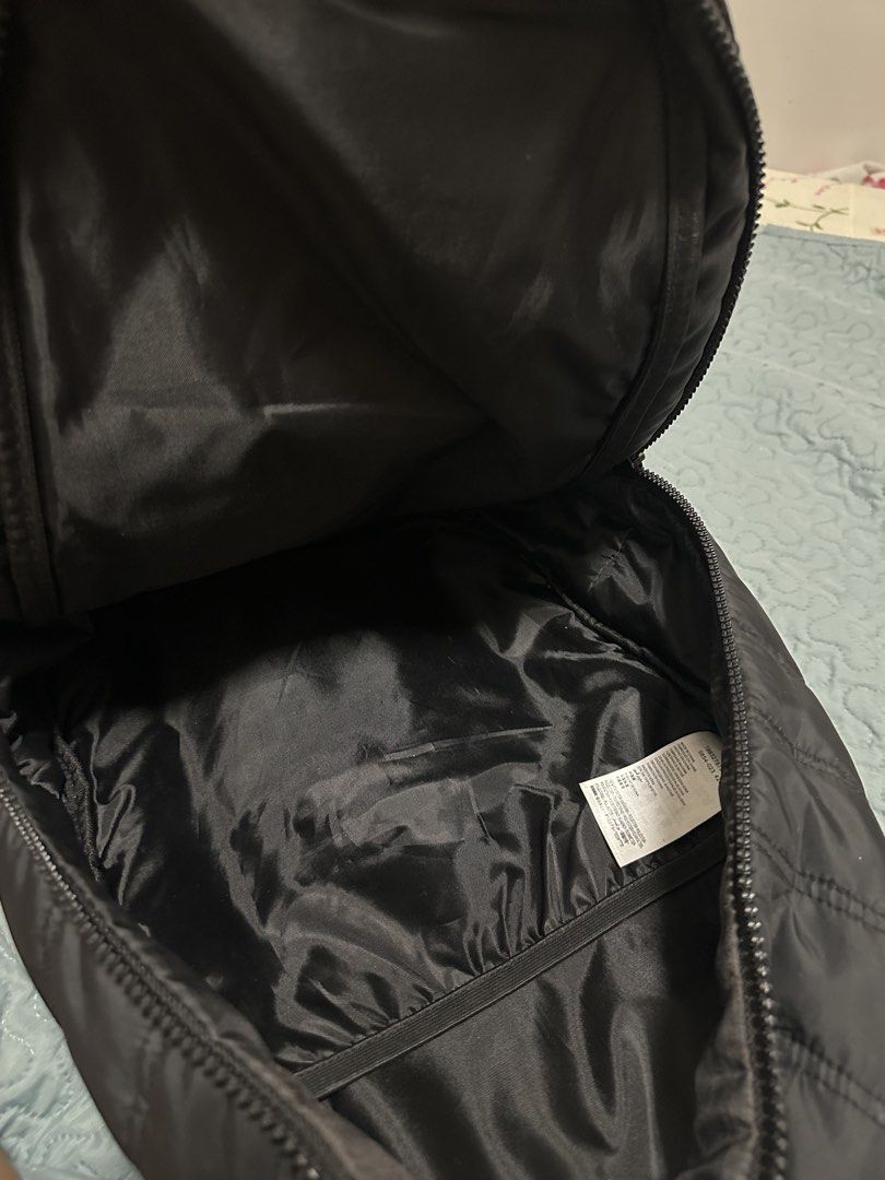 Nike Black Jordan Puffer Backpack (Category: Backpacks) located in Manila. Submitted by gowoncart (Listing ID 1449290337, Image 3). Description: bought at planet sports back in 2024, used for work and travels but no flaws very spacious, fits a 13 inch laptop but can probably fit a 15 inch too, 1 zipper pocket in front, 1 open pocket on the left side.