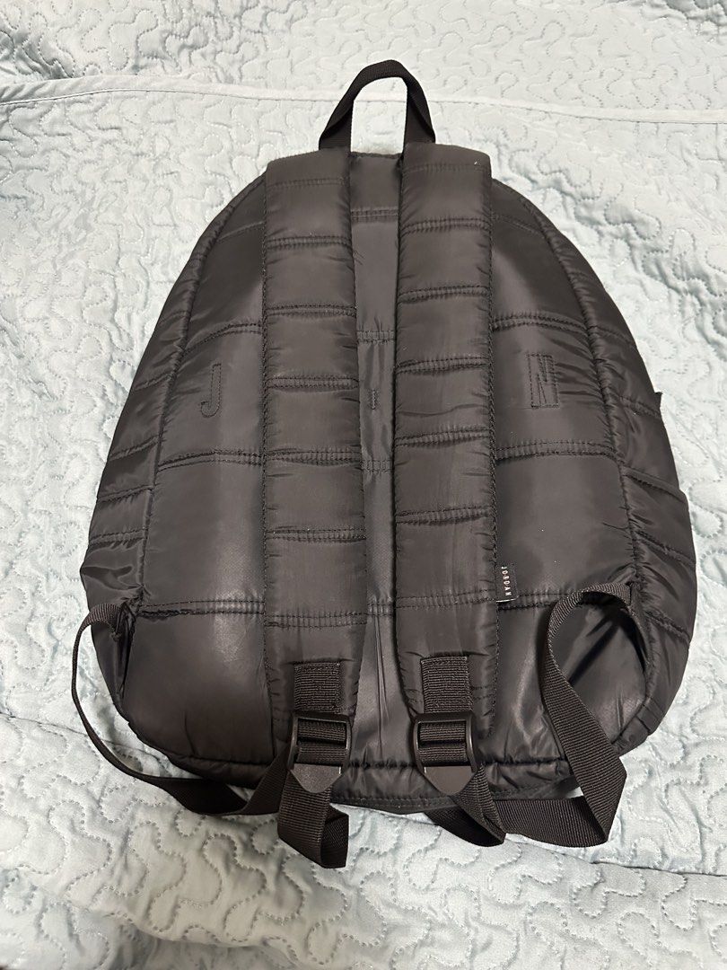 Nike Black Jordan Puffer Backpack (Category: Backpacks) located in Manila. Submitted by gowoncart (Listing ID 1449290337, Image 2). Description: bought at planet sports back in 2024, used for work and travels but no flaws very spacious, fits a 13 inch laptop but can probably fit a 15 inch too, 1 zipper pocket in front, 1 open pocket on the left side.