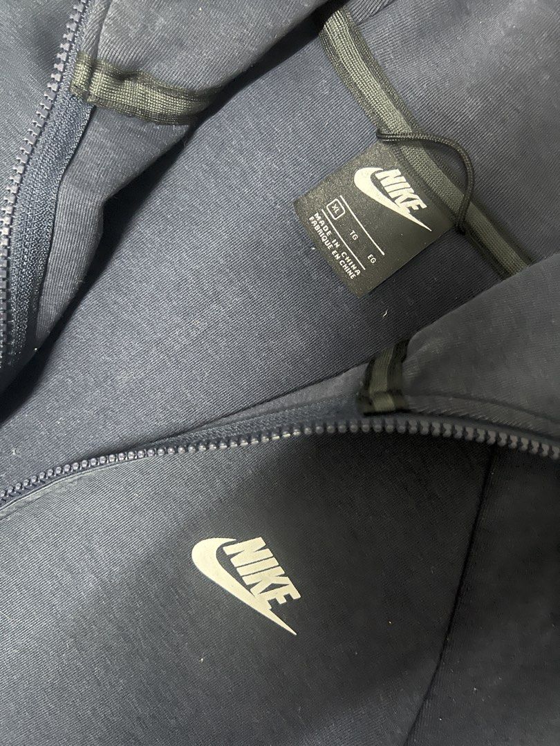 NIKE TECH FLEECE FULL ZIP HOODIE (Category: Coats, Jackets and Outerwear) located in Caloocan City. Submitted by gothrifted (Listing ID 1449127392, Image 3). Description: NIKE TECH FLEECE FULL ZIP HOODIE - thrifted - size XL - dimes: 23x27 - fair condition - issue: minimal color fading *color may vary due to lighting .