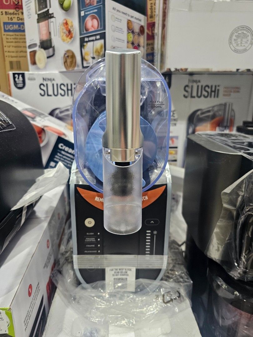 Ninja Slushi Professional Frozen Drink Maker (Category: Juicers, Blenders & Grinders) located in Makati City. Submitted by anjelincloset (Listing ID 1449310350, Image 2). Description: Slushi Professional Frozen Drink Maker Create smooth frozen drinks without ice or dilution. Large 2.6L vessel with 1.9L liquid fill capacity. Features 5 preset settings and temperature control. Rapid chill technology for quick preparation. Includes motor base, vesse