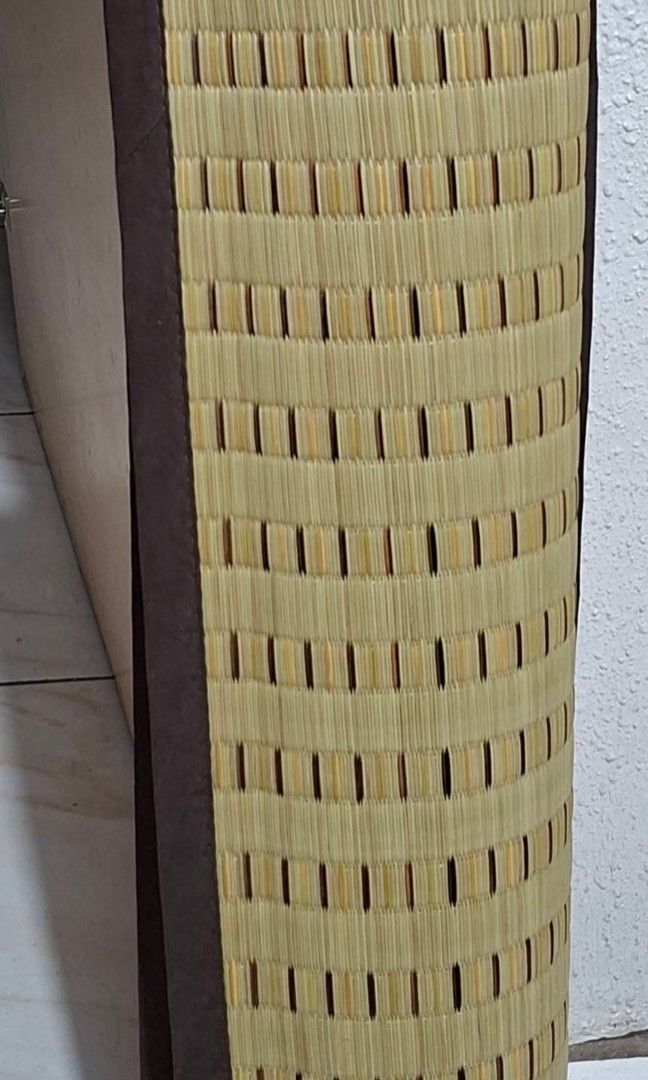 Nitori Tatami Mat 174 x 174 cm (Category: Looking For) located in Manila. Submitted by rarefindsgallery (Listing ID 1449185187, Image 2). Description: NITORI TATAMI MAT Size: 174 x 174cm This is a traditional Japanese tatami mat made from igusa (rush grass) featuring a dark brown fabric border. These eco-friendly mats are often used as lightweight flooring or rugs, known for their breathable, moisture-absorbing properties. Similar items are avail