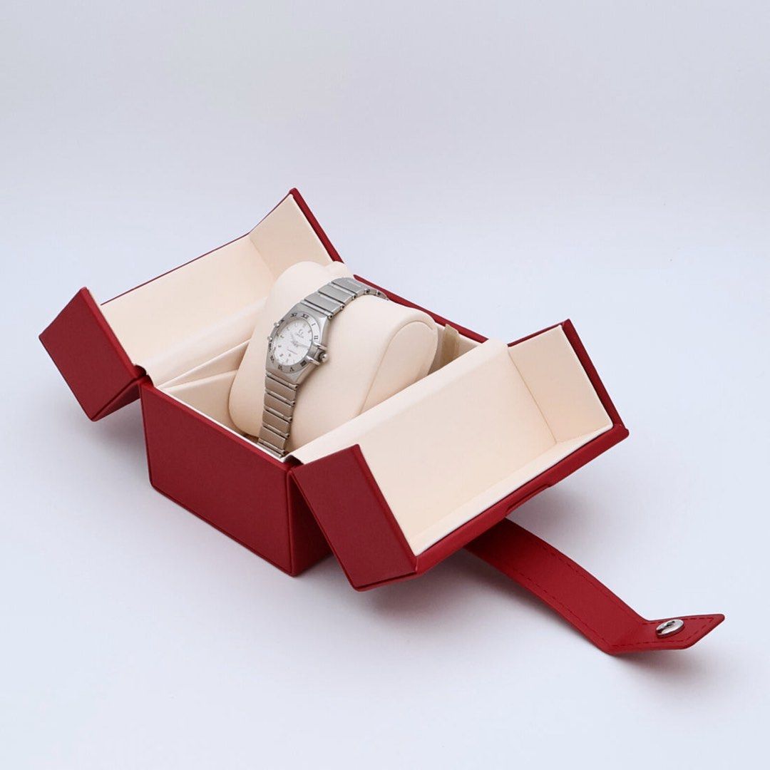 Omega Constellation Watch (Category: Luxury Watches) located in Taguig. Submitted by sourcedbym (Listing ID 1449156466, Image 2). Description: - Authentic Omega Constellation timepiece - Durable stainless steel case and band - Elegant white dial with classic Roman numerals - Comes with original red Omega watch box - Versatile for daily wear or special events - A timeless and sophisticated accessory.
