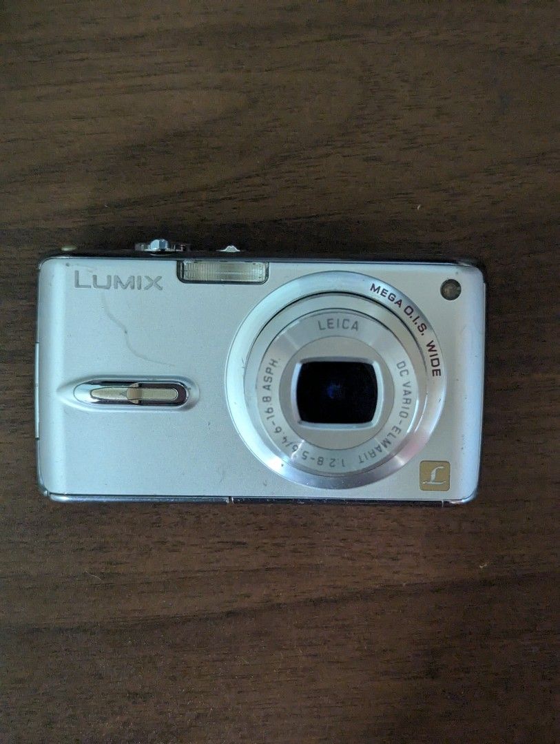 Panasonic Lumix FX07 Camera w/ Batt & Charger (Category: Cameras) located in Bacoor. Submitted by jobabombs (Listing ID 1449189434, Image 2). Description: •Works but LCD needs replacing. •Comes with the battery and the charger dm if u wanna see a vid sample Bacoor, Cavite.