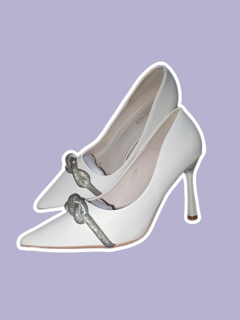 RUSH Pointed Heels Toe Stilettos with Crystal Knot | Size 39 (Category: Heels) located in Mabalacat. Submitted by _evaraaphrodite (Listing ID 1449299074, Image 1). Description: RUSH RUSH Upgrade your shoe game with these 4-inch stilettos ✨ Worn only twice—parang brand new pa. Versatile color, madaling i-match sa casual or formal outfits. Size: 39 (UK 6 / US 8) Style: Pointed toe with crystal knot Heel: 4” stiletto 📍 Dau, Mabalacat Ready for ship