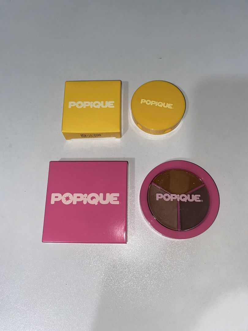 POPIQUE Makeup Set (Category: Makeup) located in Tarlac. Submitted by declutteredbyglai (Listing ID 1449262106, Image 2). Description: - lightly used for swatches - Popique Bronzer: peach corrector compact with built-in mirror. - Popique 3-Shade Eyeshadow Palette: Features versatile brown shades. - Both items come in their original packaging. - Ideal for travel or everyday makeup routines..