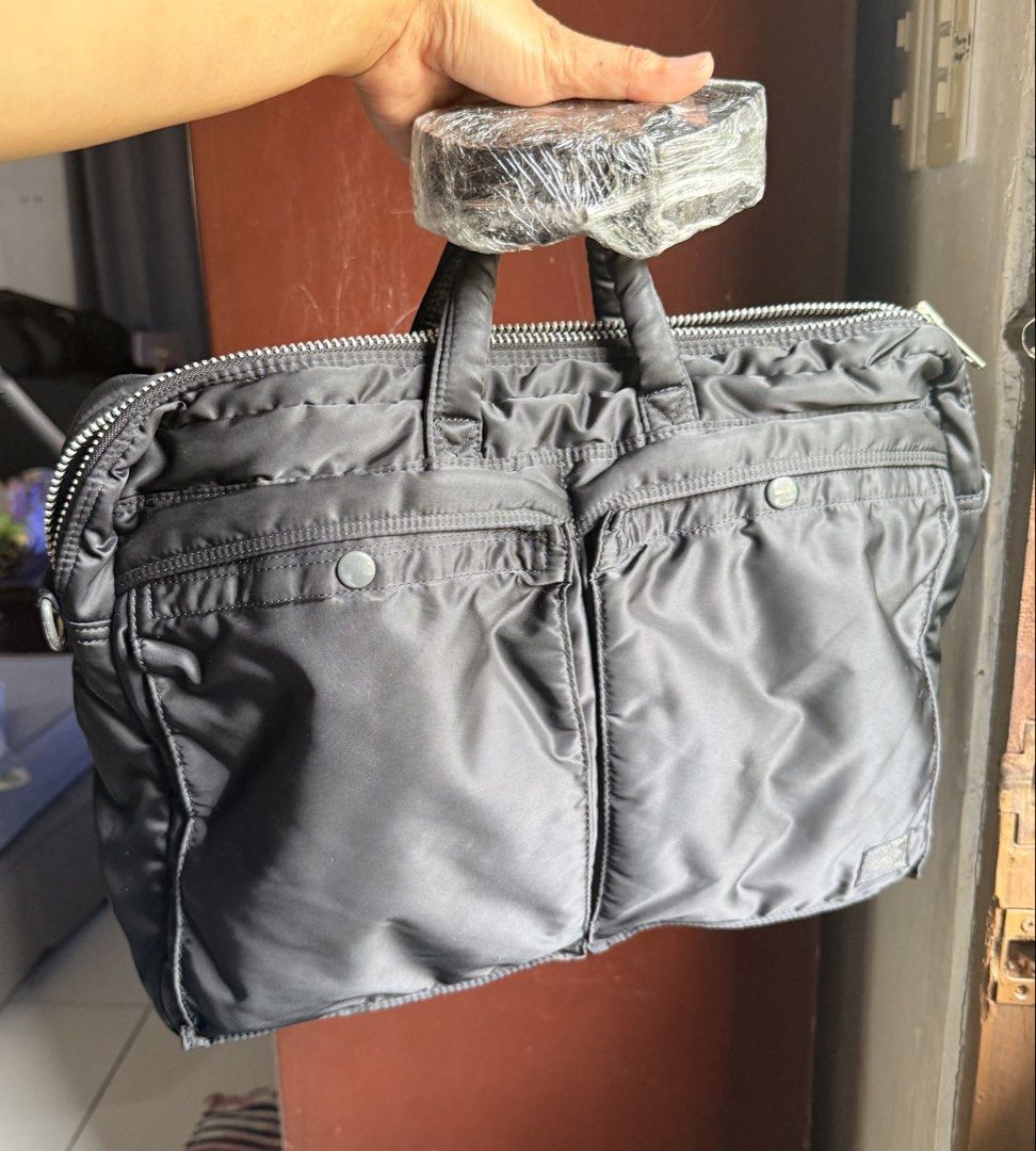 Porter Laptop Bag (Category: Luxury Bags & Wallets) located in Malolos. Submitted by flapnbloom.ph (Listing ID 1449146055, Image 2). Description: Original Classic Porter-Yoshida & Co. briefcase with strap, 2-way .