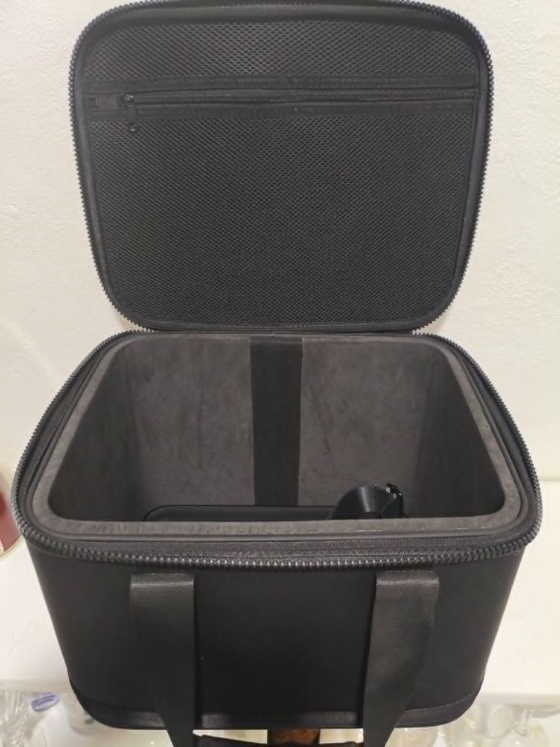 PowerArQ Carrying Case (Category: Cases & Covers) located in Cabanatuan. Submitted by sonnelp (Listing ID 1449144291, Image 3). Description: - Black carrying case with handles - Zipper closure for secure storage - Features 'PowerArQ' logo on top - Durable material for long-lasting use - Ideal for storing and transporting equipment.