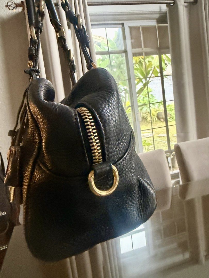 Prada (Category: Luxury Bags & Wallets) located in Paranaque City. Submitted by k_martin (Listing ID 1449109815, Image 3). Description: Prada Daino Boston Guaranteed authentic Lightly used.