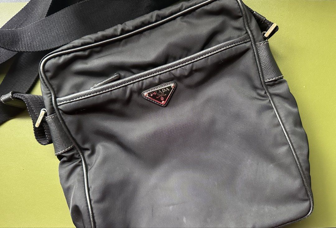 Prada Men’s Nylon Crossbody Bag (Category: Luxury Bags & Wallets) located in Pasig City. Submitted by 91_mjho (Listing ID 1449206901, Image 1). Description: Prada Men’s Nylon Crossbody Bag. With dustbag. Can send more photos upon request. All sales are final. RFS: Decluttering..