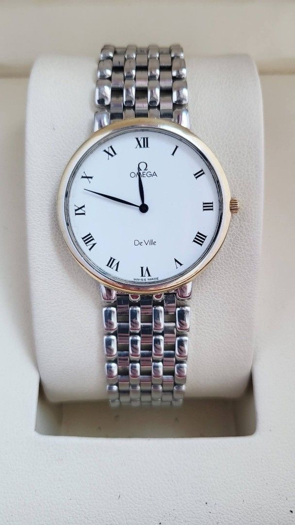 Preowned Authentic OMEGÀ DEVILLE watch for Unisex (Category: Luxury Watches) located in Manila. Submitted by rosewatches (Listing ID 1449208897, Image 1). Description: Preowned Authentic OMEGÀ DEVILLE watch for Unisex •18k bezel and lock part •33mm Case size •Fit up to 17.5cm wrist size •Quartz Movement •Excellent Condition •Providee box only! (100% Original Preowned watch) {Ready for delivery/pickup/meetup} 📍Manila, Philippines for more afforda