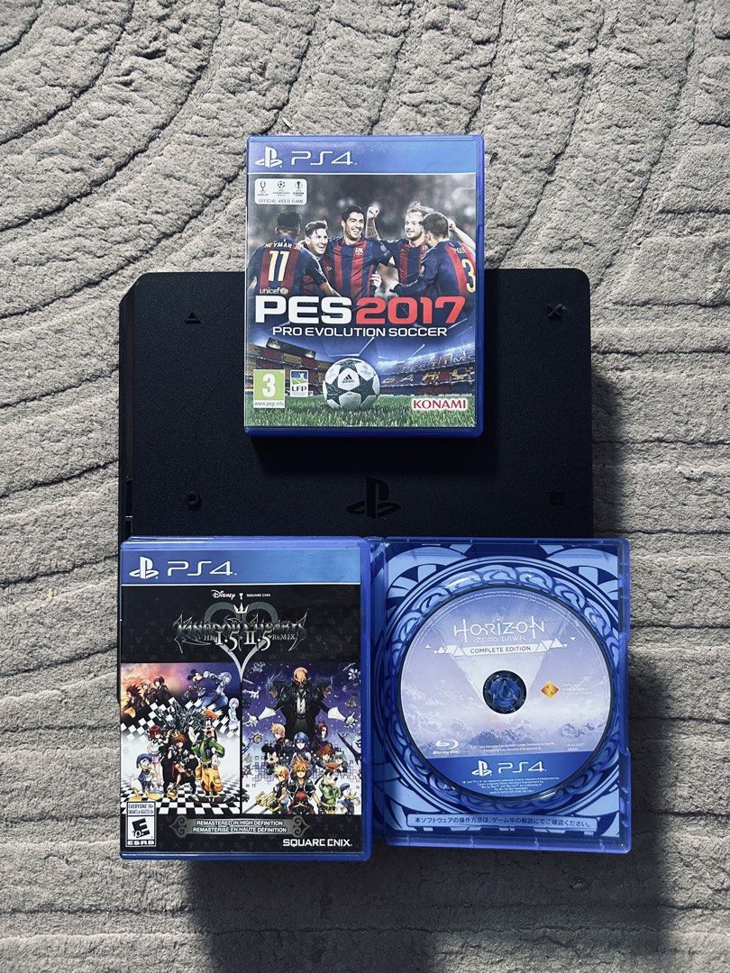 PS4 SLIM 1TB (Category: PlayStation) located in Manila. Submitted by zavgamingshop (Listing ID 1449143118, Image 3). Description: PS4 Slim 1TB Black (CUH-2218B) Premium Complete Set • 1 V2 Controller • 3 Physical Games • Complete Cables & Original Box • With Warranty • LATEST FIRMWARE Smooth Performance • Excellent Condition • Plug & Play 📍 Valenzuela Cash on Delivery Available.
