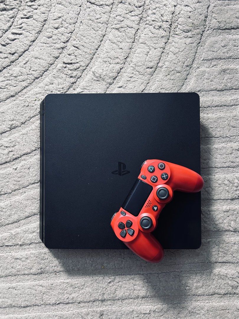 PS4 SLIM 500GB (Category: PlayStation) located in Manila. Submitted by zavgamingshop (Listing ID 1449143483, Image 2). Description: PS4 Slim 500GB Black (CUH-2218A) Premium Complete Set • 1 V2 Controller • 2 Physical Games • Complete Cables & Original Box • With Warranty • LATEST FIRMWARE Smooth Performance • Excellent Condition • Plug & Play 📍 Valenzuela Cash on Delivery Available.