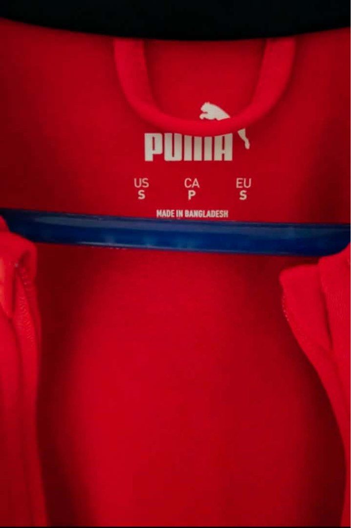 Puma Red Track Jacket Zip Up (Category: Coats, Jackets and Outerwear) located in Bacoor. Submitted by jayps07 (Listing ID 1449238418, Image 3). Description: - Red Puma track jacket - Full zip closure - Long sleeves - Size S - Made in Bangladesh - Ideal for sports or casual wear.