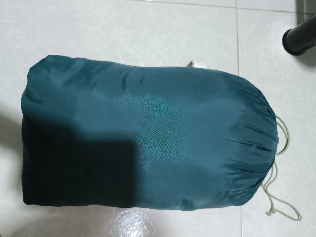 Quechua Basic Sleeping Bag (Category: Hiking & Camping) located in Singapore. Submitted by kelven585800 (Listing ID 1449150494, Image 2). Description: - Decathlon Quechua sleeping bag - Basic model - Comfortable temperature: 20°C (68°F) - Colour: Dark teal - Easy to pack and carry - Ideal for camping trips.