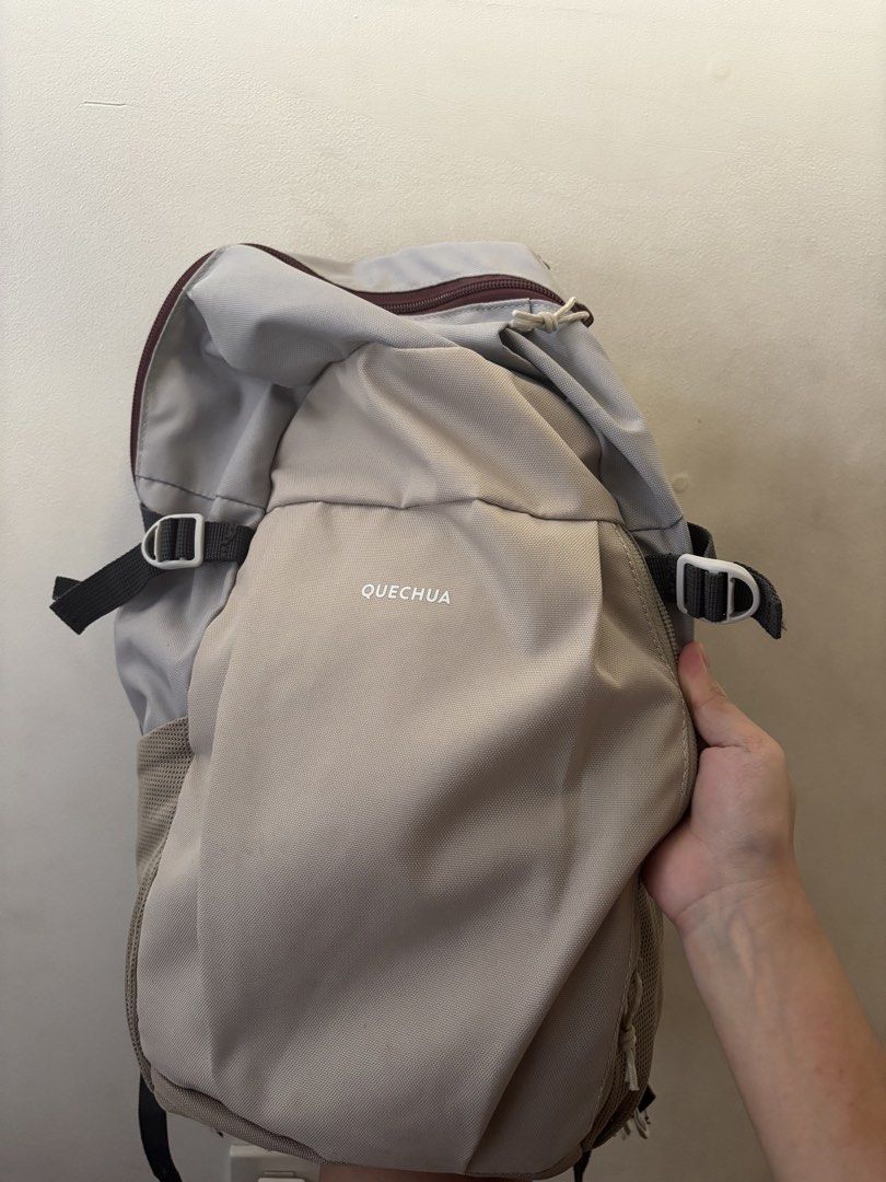 Quechua Hiking Backpack (Category: Backpacks) located in Quezon City. Submitted by hk_62000 (Listing ID 1449180184, Image 1). Description: - Quechua backpack in light grey and beige. - comfortable padded shoulder straps with buckles - side mesh pockets for water bottles. - Includes a zipped main compartment and a front pocket. - Ideal for day trips or hiking adventures. - RFS: No longer being used.