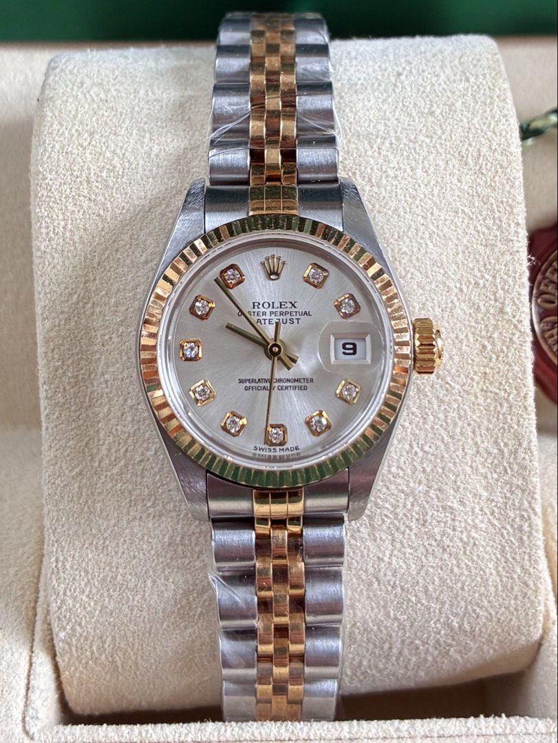 Rolex Datejust 26mm (Category: Luxury Watches) located in Cebu City. Submitted by cebluxxe_watches (Listing ID 1449279860, Image 2). Description: Rolex Datejust 26mm 79173 Two-tone yellow gold (Most sought after combination) Silver Dial with Big diamonds Year 2002 Very Mint condition Comes as Watch only (Lost paper) ✅ Always Open for re-authentication ✅ Trades accepted ✅ 6 months warranty on movement ✅ 100% Money back guarantee.
