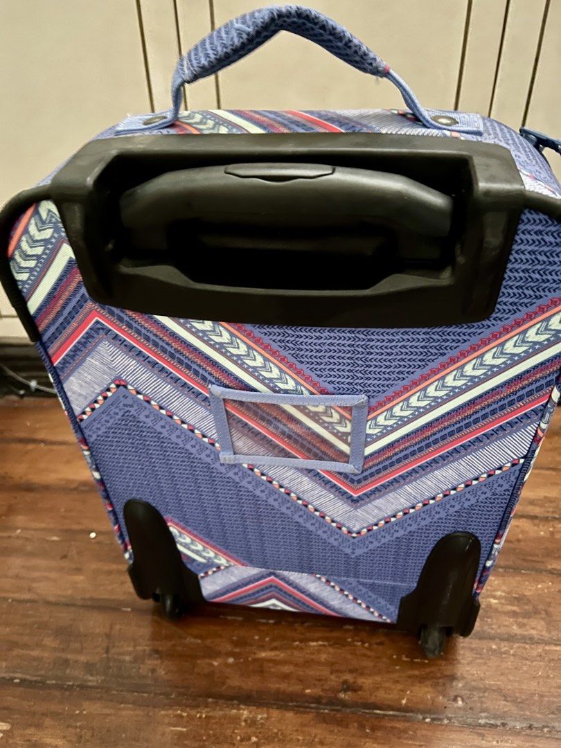 Roxy luggage trolley bag (Category: Luggage) located in Paranaque City. Submitted by elle21fabfinds (Listing ID 1449211264, Image 3). Description: Roxy luggage, perfect as hand carry luggage or outing bag. Only flaw is the cracked rubber on the wheel due to storage, need to replace. But overall, the body/ zippers are in excellent condition. .