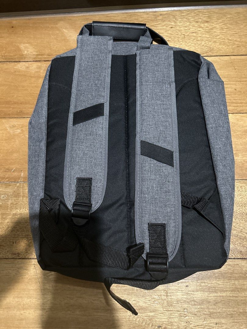 Rudy Project Grey Backpack with Multiple Compartments (Category: Backpacks) located in Manila. Submitted by Declutterland (Listing ID 1449282263, Image 2). Description: - Stylish grey backpack with black accents. - Main compartment with securing straps for your belongings. - Front compartment with mesh pockets and zippered sections for easy organization. - Comfortable padded shoulder straps. - Convenient top handle for alternative carrying. - Ide
