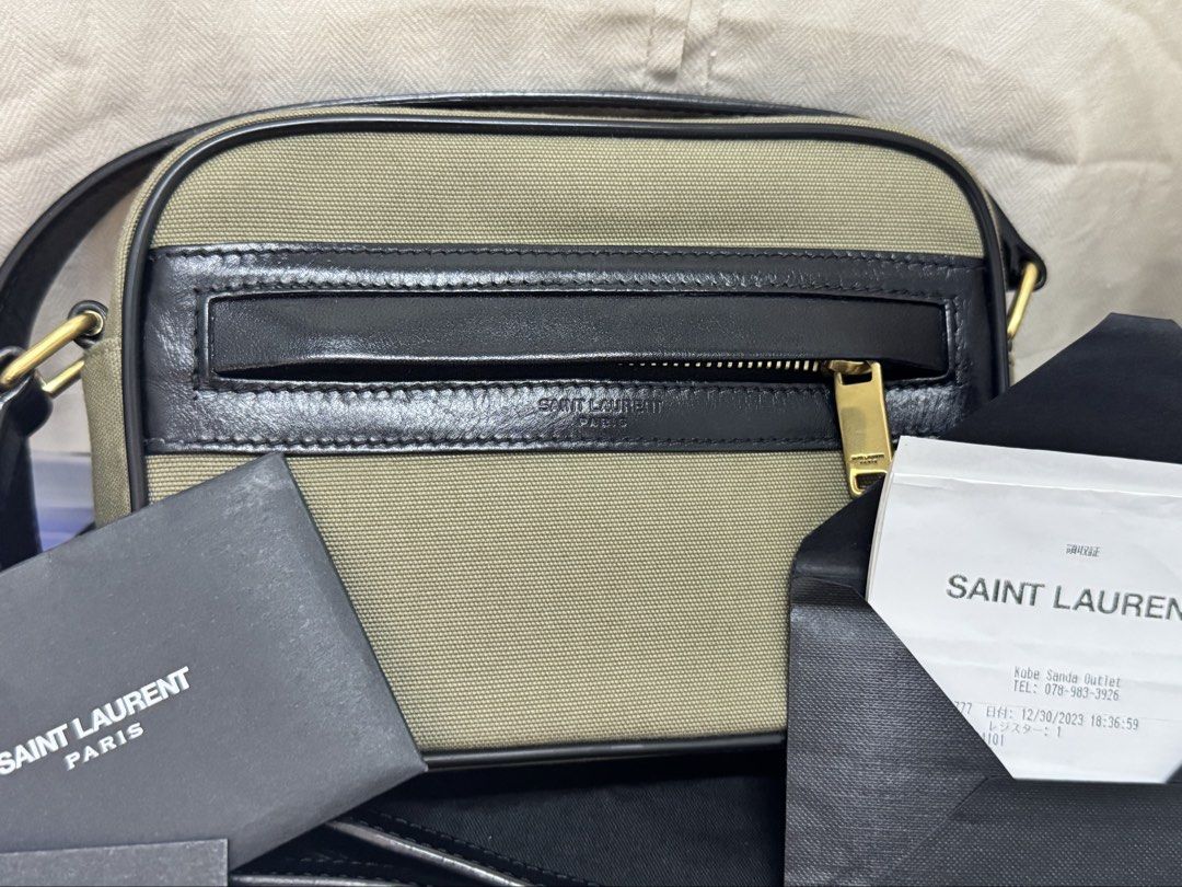 Saint laurent Camp Bag (Category: Luxury Bags & Wallets) located in Cagayan de Oro. Submitted by rjstz (Listing ID 1449134094, Image 1). Description: Saint laurent Camp Camera Messenger bag khaki, Green canvass/calf leather made in italy bought Japan kobe Sanda Outlet-premium (the biggest expensive luxury outlet mall in western japan) reference samsung s24 ultra w/ case inside complete dustbag,card and receipt 6th pic when worn preloved here sell