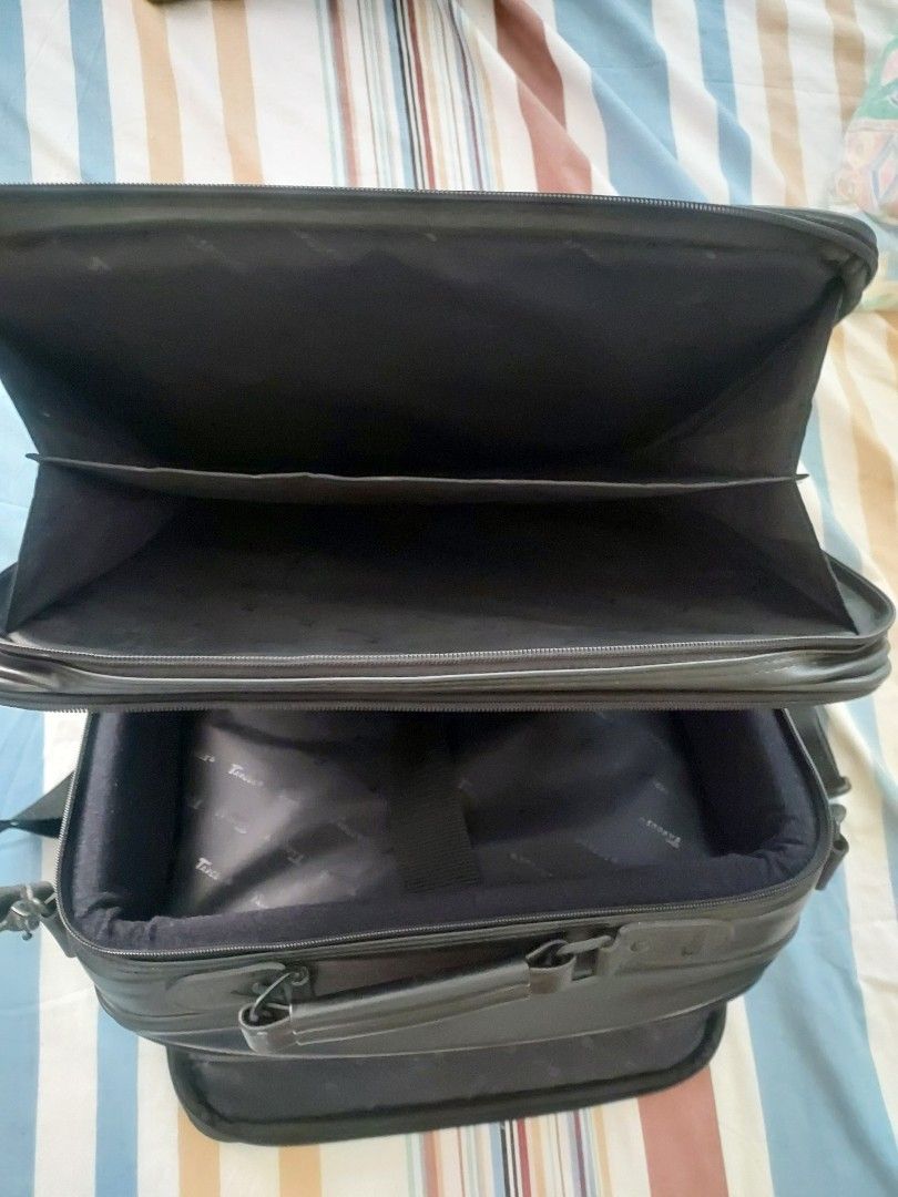 Targus Black Leather Laptop Bag Briefcase (Category: Briefcases) located in Las Pinas. Submitted by jerri44 (Listing ID 1449111767, Image 3). Description: - Genuine Targus black leather briefcase for 14inch laptop - Multiple interior compartments for organized storage - Padded section specifically for laptop protection - Comfortable, detachable shoulder strap included - Sturdy top handle for easy carrying - All zippers are in excellent working co