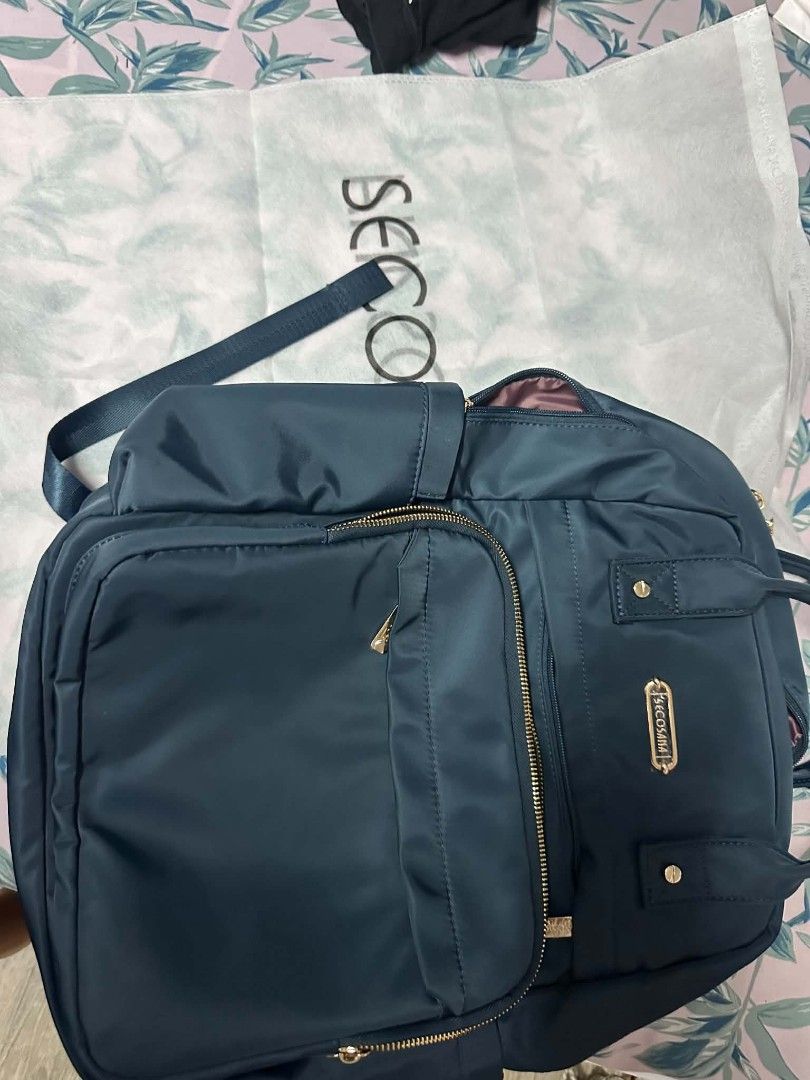 Secosana Bluegreen Backpack (Category: Backpacks) located in Quezon City. Submitted by jrmill (Listing ID 1449250612, Image 2). Description: - Secosana backpack in a stylish blue color. - Features multiple compartments for excellent organization. - Adjustable straps ensure a comfortable fit. - Ideal for everyday use or your next travel adventure. - Original Price: P2,699.00 - But nabili siya for P1,300.00.