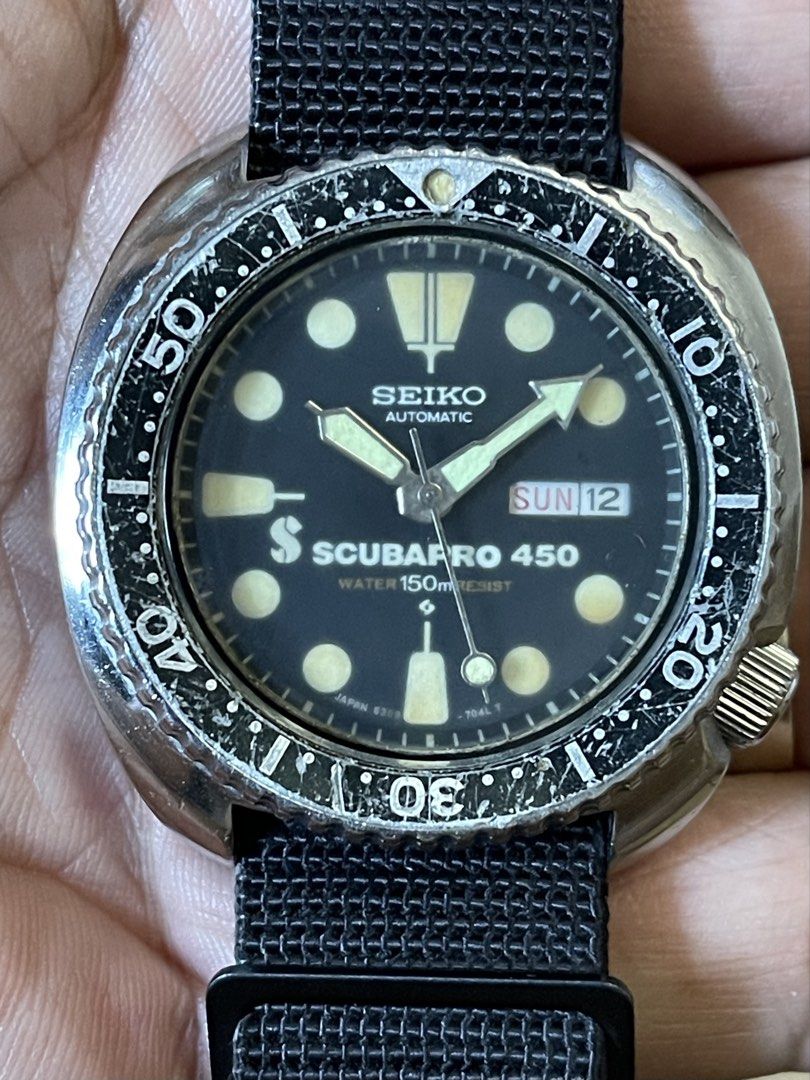 Seiko Scubapro 450 Reference 6309-7040 Automatic Diver (1981) – Watch Only (Category: Men's Watches) located in Manila. Submitted by tonyv613 (Listing ID 1449188697, Image 2). Description: A sought-after vintage Seiko diver from February 1981, featuring the reliable 6309A automatic movement. A great piece for collectors looking for an honest, well-preserved Scubapro 450. Specifications: * Reference: 6309-7040 * Movement: Seiko 6309A Automatic (17