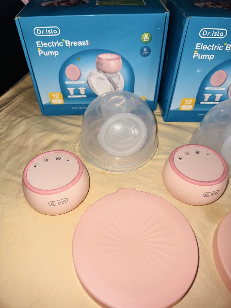 Dr. Isla Wearable Electric Breast Pump 2 PCS. (Category: Breastfeeding & Bottle Feeding) located in Manila. Submitted by mariejoytolero (Listing ID 1449182570, Image 1). Description: Selling my Dr. Isla Wearable Electric Breast Pump 2 PCS. Wireless Electric Breast Pump 4 Modes 12 Levels 19/24/27mm EB30 (Color PINK) Note: Used once Free: Breast Milk Storage Bag (10 PCS.) Message me if interested ☺️.