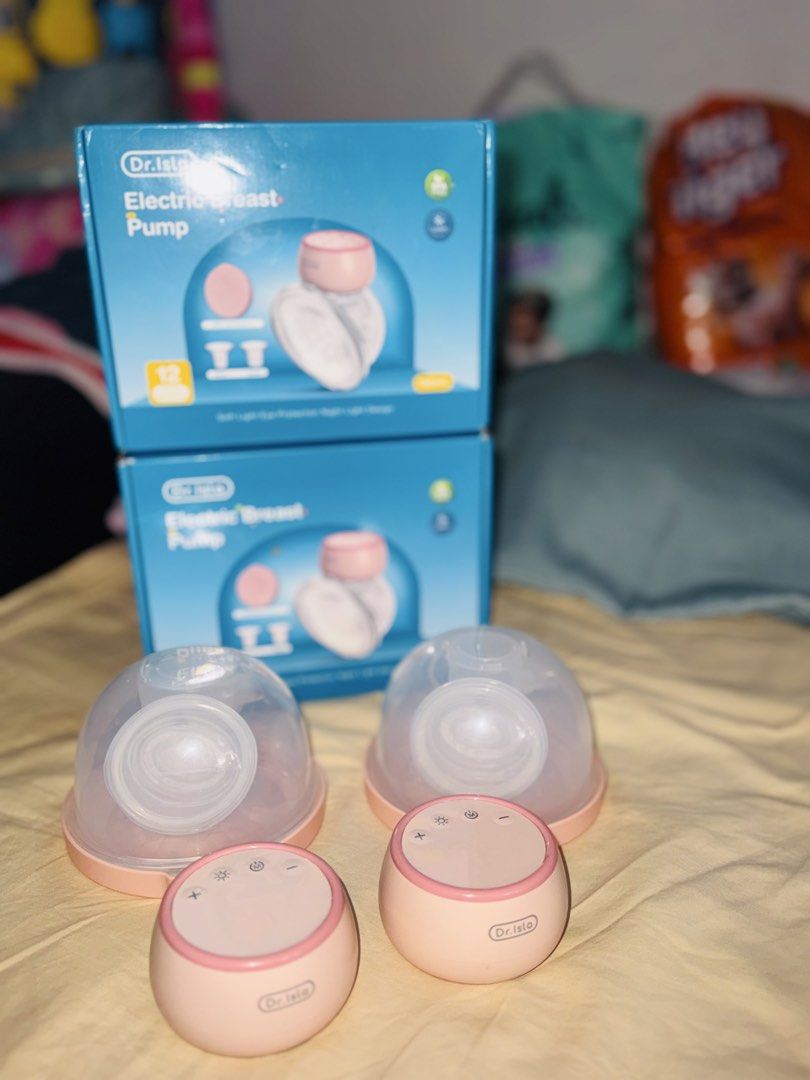 Dr. Isla Wearable Electric Breast Pump 2 PCS. (Category: Breastfeeding & Bottle Feeding) located in Manila. Submitted by mariejoytolero (Listing ID 1449182570, Image 2). Description: Selling my Dr. Isla Wearable Electric Breast Pump 2 PCS. Wireless Electric Breast Pump 4 Modes 12 Levels 19/24/27mm EB30 (Color PINK) Note: Used once Free: Breast Milk Storage Bag (10 PCS.) Message me if interested ☺️.