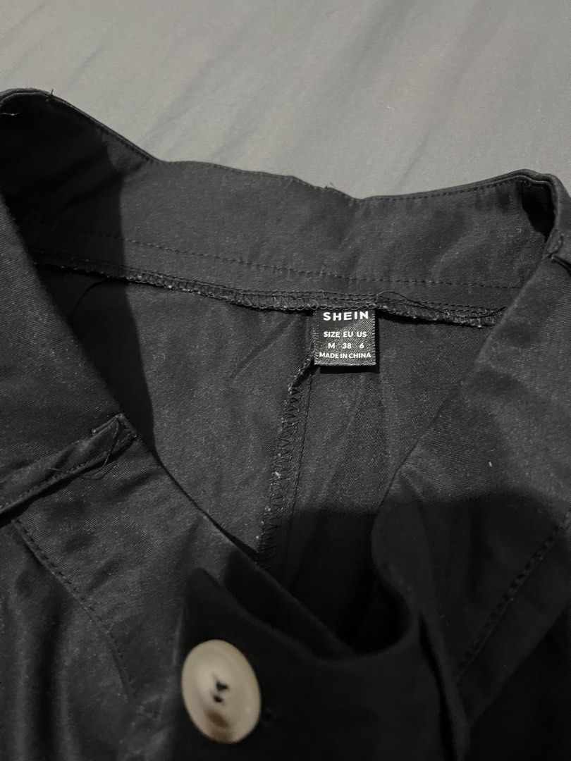 SHEIN Black High Waisted Shorts (Category: Shorts) located in Mandaluyong City. Submitted by blzstr (Listing ID 1449222210, Image 3). Description: - Brand: SHEIN - Color: Black - Size: M - Style: High-waisted shorts - Closure: Button and zip - Features: Belt loops, pleated front, cuffed hem - Condition: worn once - Versatile: Great for casual or dressed-up looks.