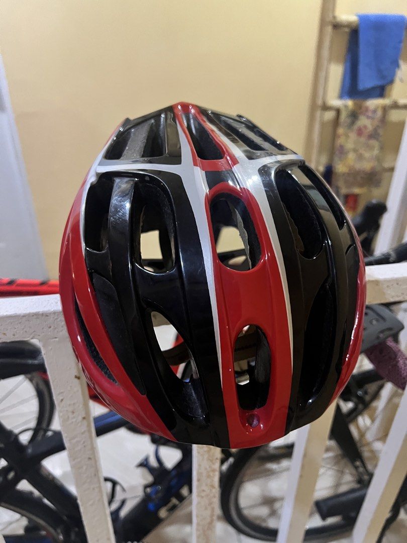 Specialized Red Black White Cycling Helmet (Category: Bicycles) located in Santa Rosa. Submitted by wilmabhernandez-21945 (Listing ID 1449240743, Image 3). Description: - Specialized cycling helmet in red, black, and white. - Features excellent ventilation with multiple large vents. - Adjustable straps and internal fit system for a secure and comfortable fit. - Ready for your next road cycling adventure..