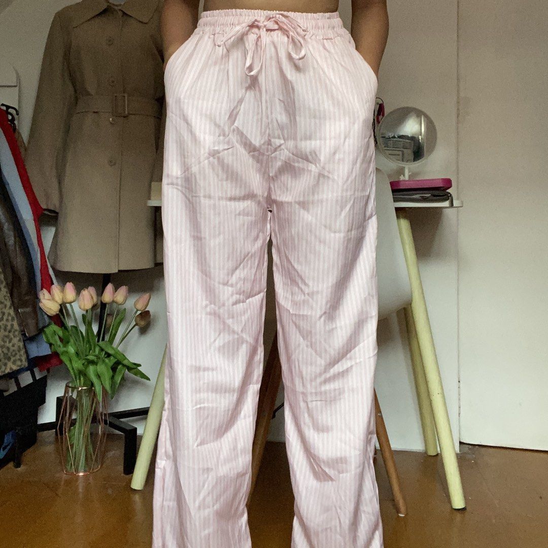 Stripes Loose Pants (From Thailand) (Category: Other Bottoms) located in Santa Rosa. Submitted by 07mkl (Listing ID 1449130994, Image 2). Description: Stripes Loose Pants (From Thailand) • Size: xs to med • Condition: 10/10 — Brand New • Flaws: none • Color: Baby Pink & White ₱200✨.