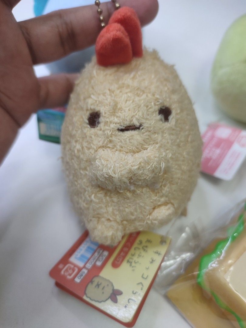 Sumikko Gurashi Chicken Plush Keychain Charm (Category: Plushies & Soft Toys) located in Manila. Submitted by epicmountain-f20453 (Listing ID 1449121172, Image 1). Description: - Adorable Sumikko Gurashi chicken plushie - Features a convenient keychain attachment - Comes with original tags, ensuring authenticity - Ideal for decorating bags or as a collectible item - Part of a set, but available for individual purchase - Check out other listings f