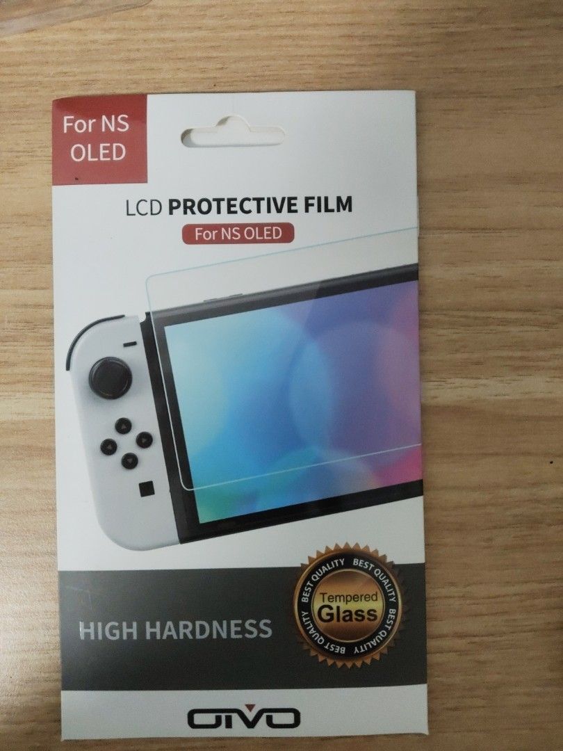Switch OLED Screen Protector (Category: Nintendo) located in Singapore. Submitted by aavor.2123e6 (Listing ID 1449257301, Image 1). Description: - High hardness tempered glass - Specifically for Nintendo Switch OLED - Protects screen from scratches and damage -Pretty Much Fully Sealed -No refunds .