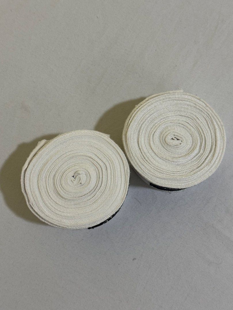 The Lab Boxing Muay Thai Hand Wraps White (Category: Combat Sports) located in Mandaluyong City. Submitted by joanne7a (Listing ID 1449175022, Image 3). Description: - Brand: The Lab - Color: White - Ideal for: Boxing, Muay Thai training - Closure: Secure velcro - Length: Standard - Benefits: Protects hands during sparring and bag work - RFS: not using anymore Barely used.