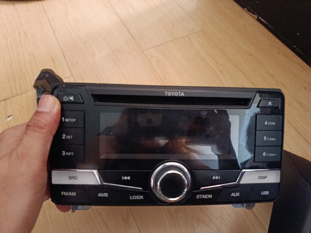 Toyota Avanza 2018 Head Unit (Category: Audio, Video, Alarm and other Electronic Accessories) located in Pasig City. Submitted by pinkymon1029 (Listing ID 1449283757, Image 1). Description: - Genuine Toyota Avanza 2018 Head Unit - Direct fit replacement - Excellent working condition - Sleek black design with clear display - Includes all visible buttons and ports (USB, AUX) - Perfect for upgrading or replacing your car's audio system.
