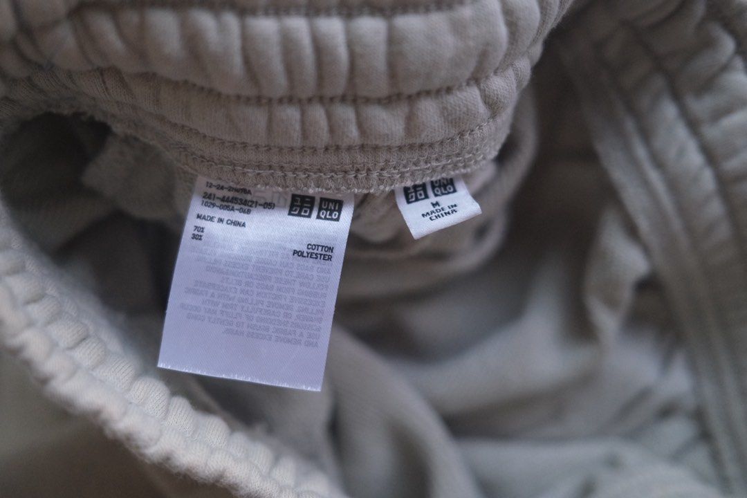 Uniqlo Sweatpants Light Green (Category: Other Bottoms) located in Naga. Submitted by billysstuff (Listing ID 1449217690, Image 2). Description: - Uniqlo Sweatpants - Color: Beige - Size: Medium (M) - Material: Cotton & Polyester Blend - Features: Elastic waistband with drawstring, cuffed ankles - Ideal for: Lounging, casual wear, everyday comfort.