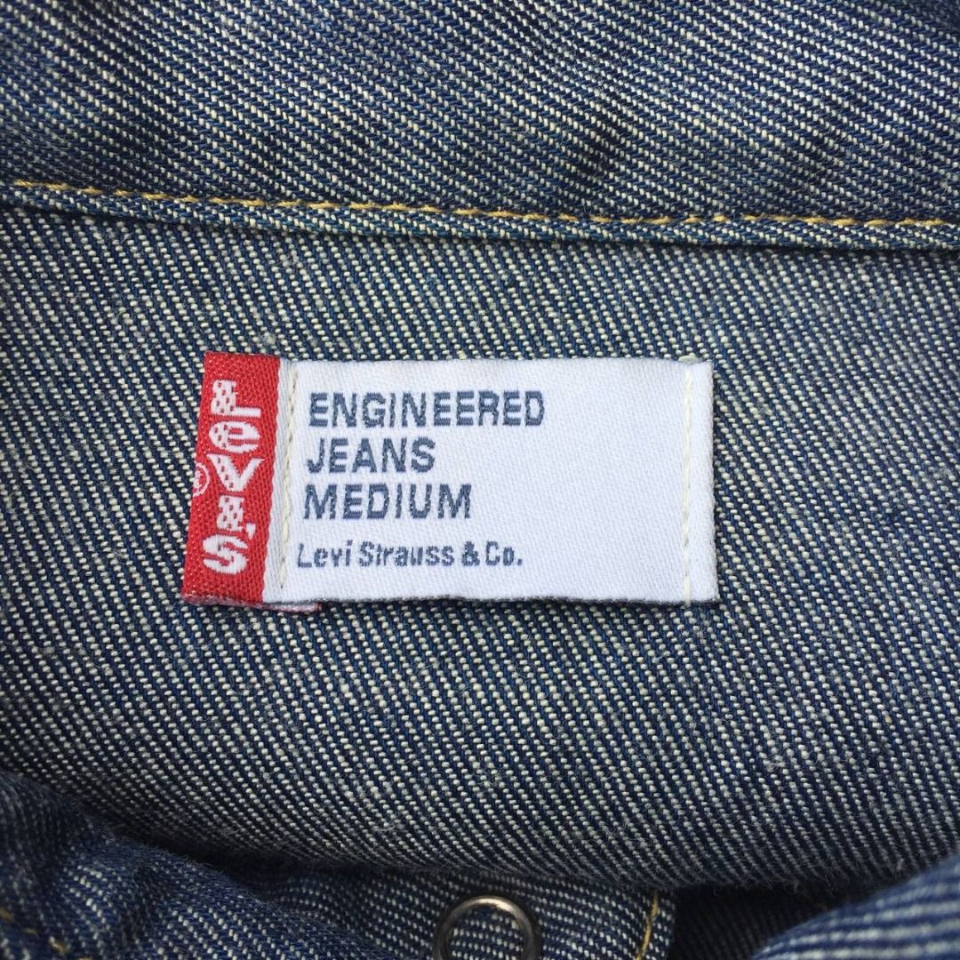 Vintage 2000s LEVIS Enginered Jeans Shirt Jacket (Category: Coats, Jackets and Outerwear) located in Pagsanjan. Submitted by ovothrift (Listing ID 1449198028, Image 2). Description: length - 30 width pit to pit - 19 Manufactured June 2000 very good condition authentic made in japan on tag issue - missing patch, has very minimal fade (see 3 last pics), Features asymmetrical chest pocket, asymmetrical or twisted stitching on sleeves and body design