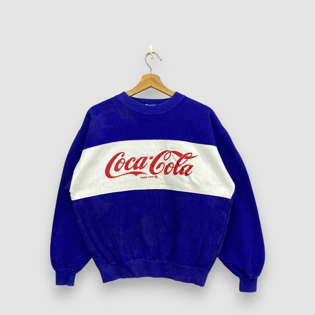 Vintage 80s Coca Cola Sweater Blue Large Coke Sweatshirt Jumper Size L (Category: Hoodies) located in Kuala Lumpur. Submitted by prelovered_closets (Listing ID 1449206204, Image 1). Description: ** All item are negotiable. ** Ship-out on SUNDAY and GDEX Shipping service ONLY. Vintage 80s Coca Cola Sweater Coke Sweatshirt Jumper GF20366 Tag: Coca Cola Manual Measurement (Laying Flat): Chest Armpit to Armpit: 21 inch Length: 23 inch (Please compare
