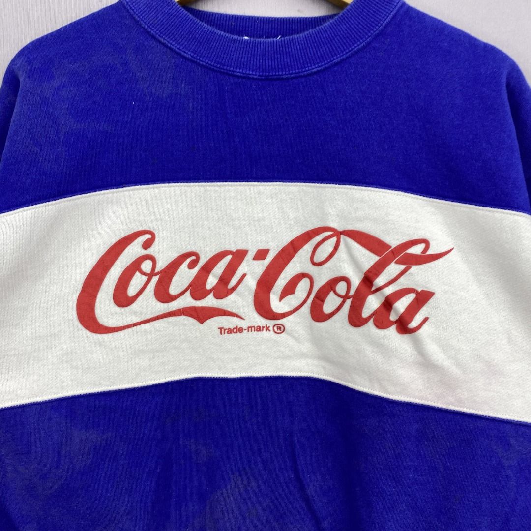Vintage 80s Coca Cola Sweater Blue Large Coke Sweatshirt Jumper Size L (Category: Hoodies) located in Kuala Lumpur. Submitted by prelovered_closets (Listing ID 1449206204, Image 2). Description: ** All item are negotiable. ** Ship-out on SUNDAY and GDEX Shipping service ONLY. Vintage 80s Coca Cola Sweater Coke Sweatshirt Jumper GF20366 Tag: Coca Cola Manual Measurement (Laying Flat): Chest Armpit to Armpit: 21 inch Length: 23 inch (Please compare