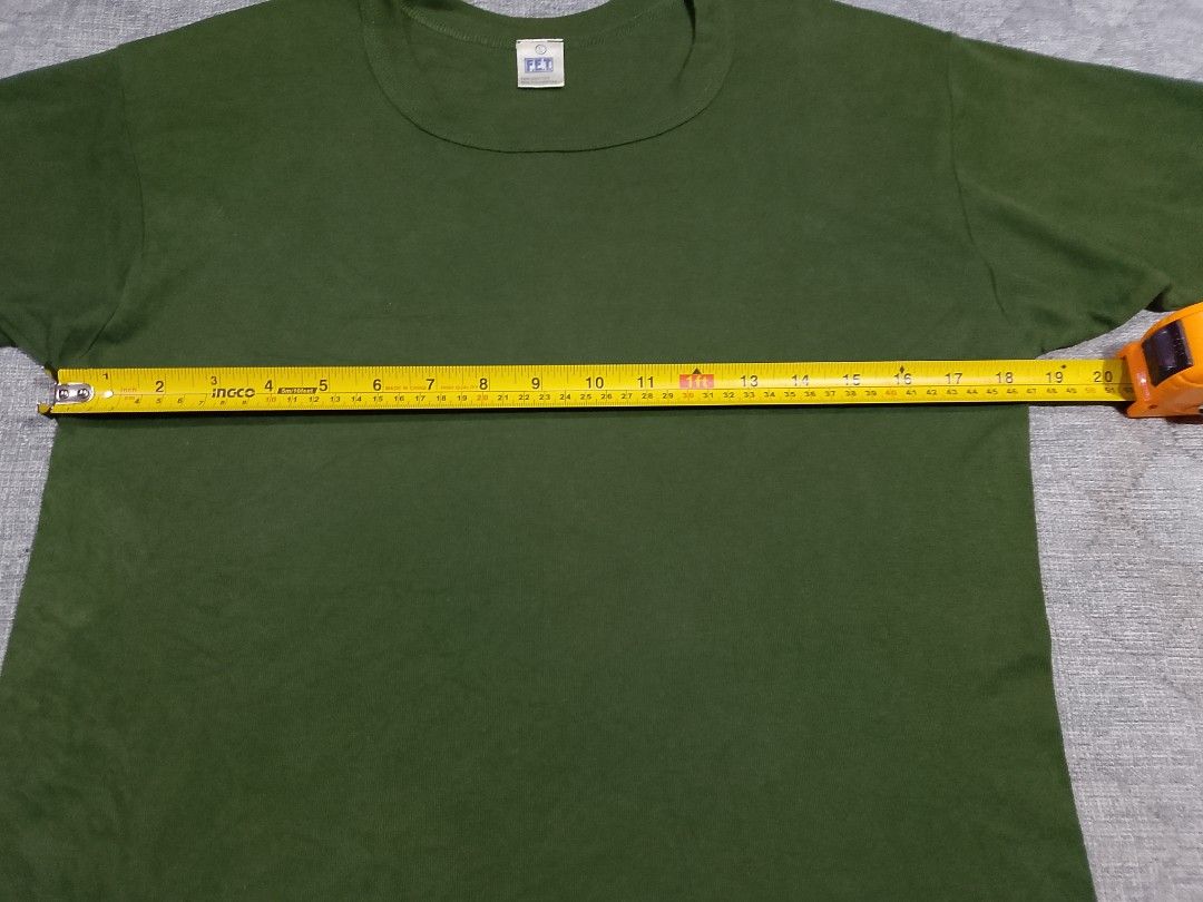 Vintage 90's single stitch green Military undershirt (Category: Activewear) located in Cadiz. Submitted by comradstuff (Listing ID 1449263921, Image 2). Description: Vintage 90's single stitch green Military undershirt w 18.5" l 26".