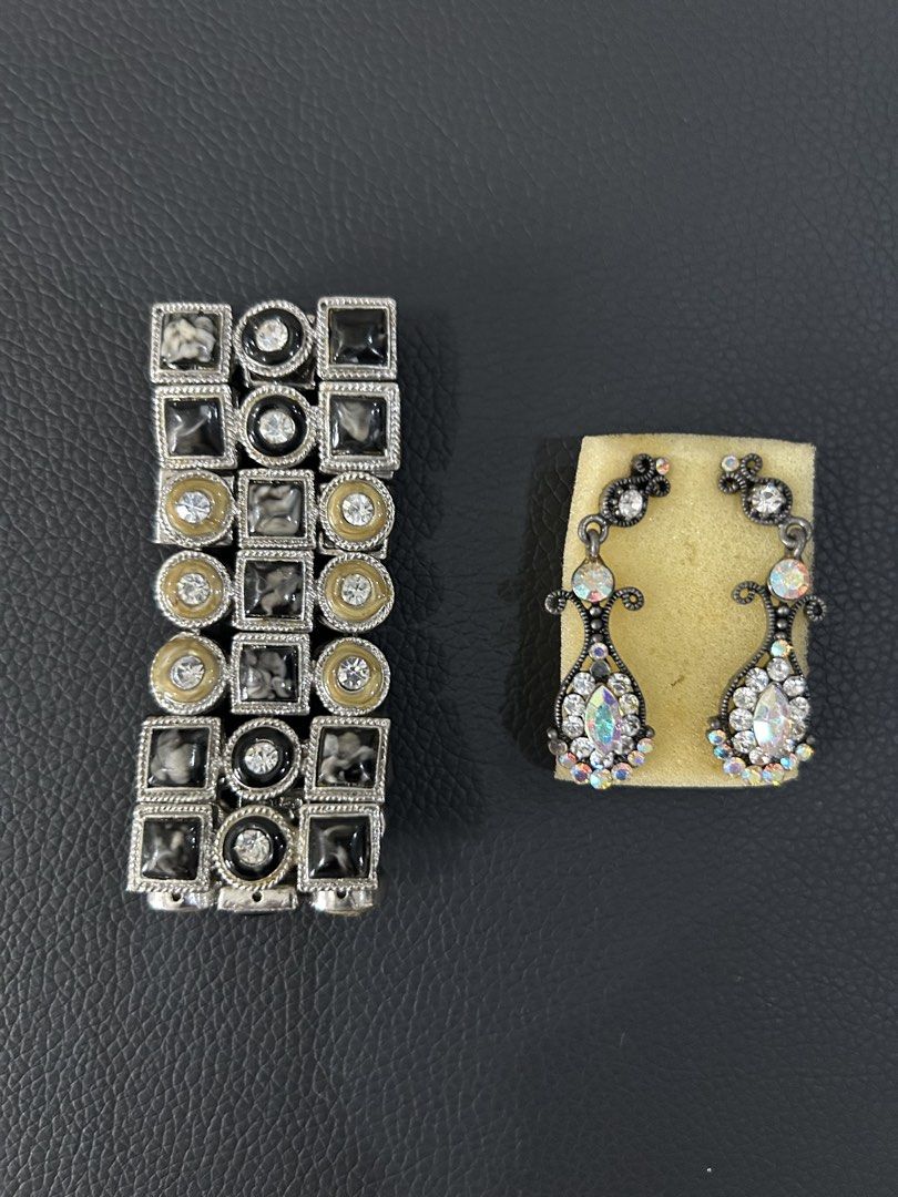 Vintage bangle and earrings set (Category: Bracelets) located in Manila. Submitted by declutteringpixie (Listing ID 1449107220, Image 1). Description: 15 year old vintage bangle with faux stones and boho-inspired earrings with stones set Used a few times Very pretty when worn and they really catch the stage lights beautifully Bangle still looks the same as when first bought One earring is lacking 2 stones but not noticeable when worn Bought brand