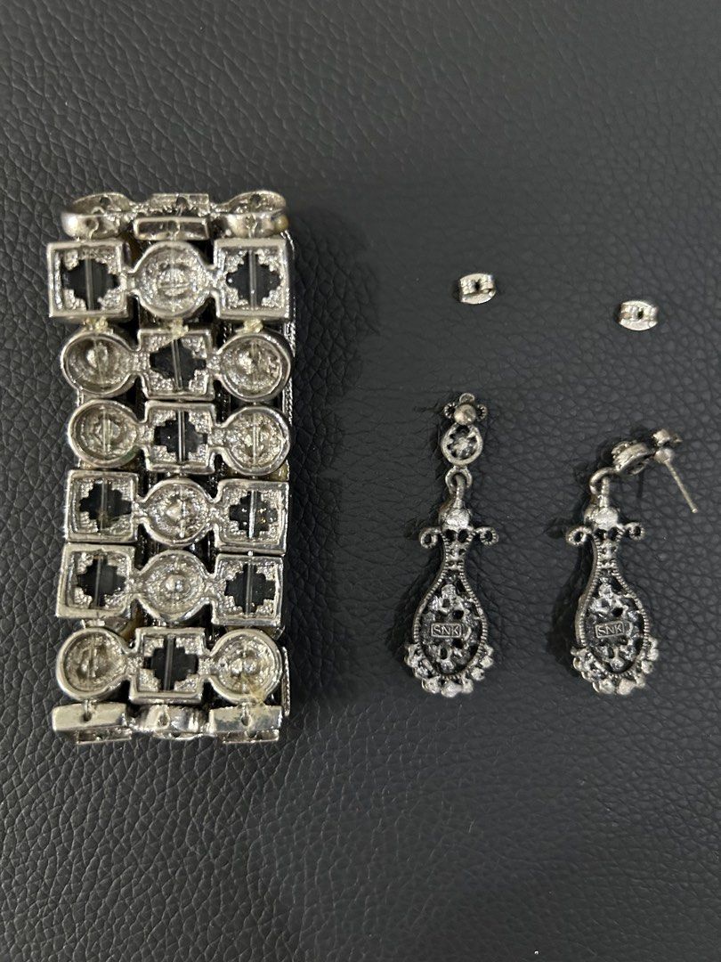 Vintage bangle and earrings set (Category: Bracelets) located in Manila. Submitted by declutteringpixie (Listing ID 1449107220, Image 3). Description: 15 year old vintage bangle with faux stones and boho-inspired earrings with stones set Used a few times Very pretty when worn and they really catch the stage lights beautifully Bangle still looks the same as when first bought One earring is lacking 2 stones but not noticeable when worn Bought brand